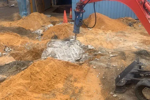 Breaking out buried concrete in sandy Perth soil